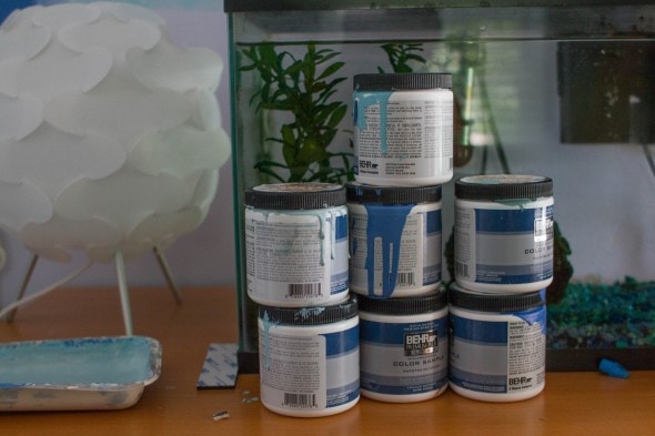 7 cans of sample paint