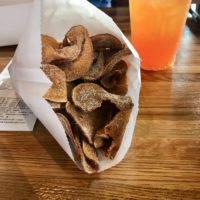 handmade sweet potato chips on a restaurant table.