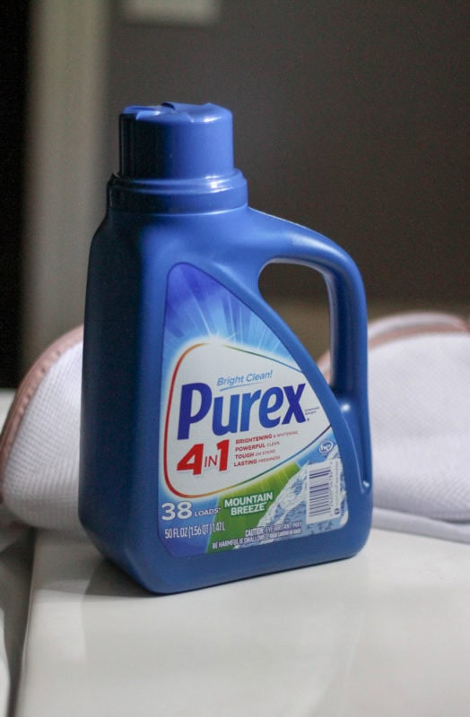 blue bottle of Purex laundry detergent.