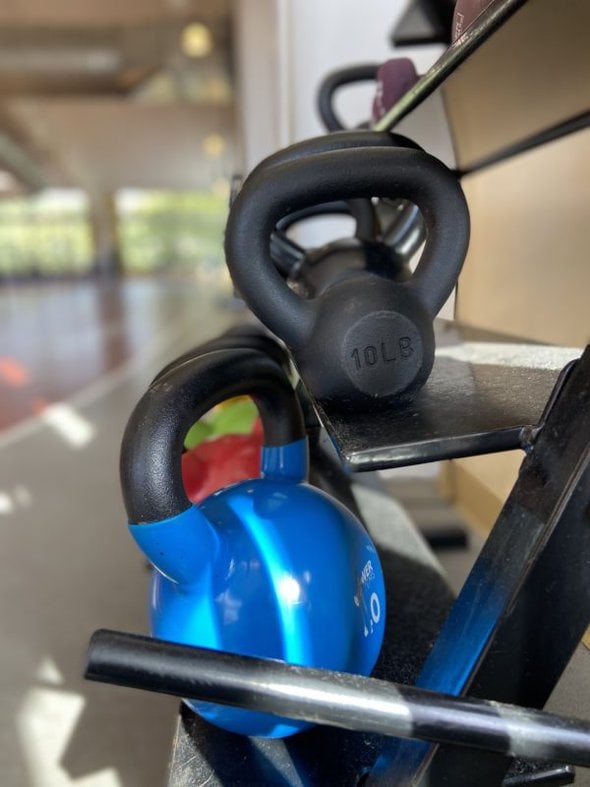 kettlebells on a rack.