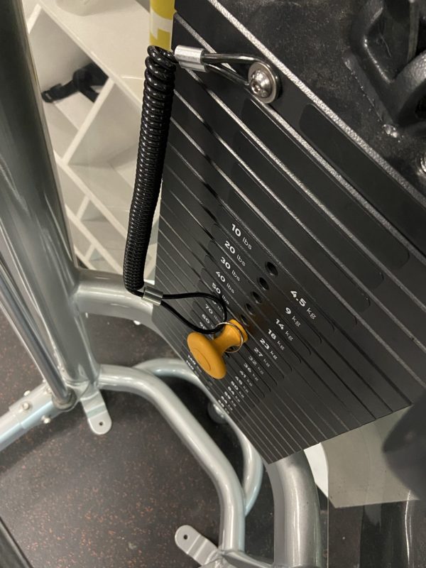 stack of weights on a gym machine.