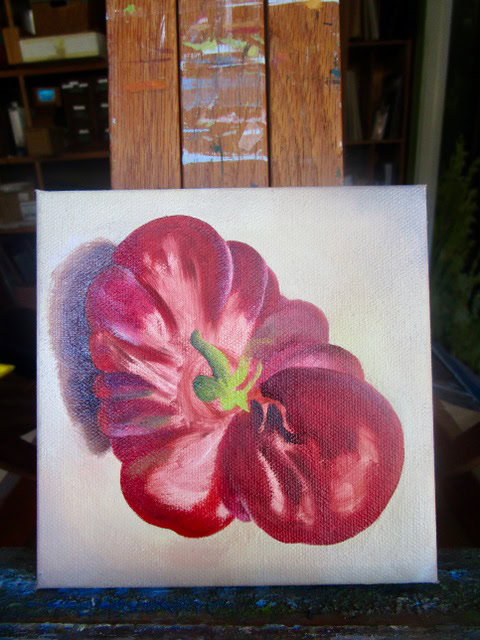 tomato painting on easel.