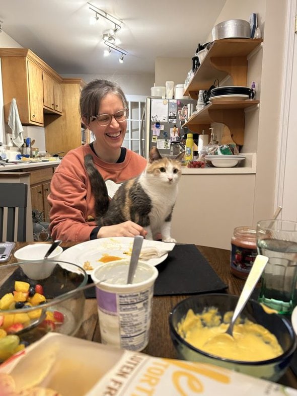 cat on kristen's lap.