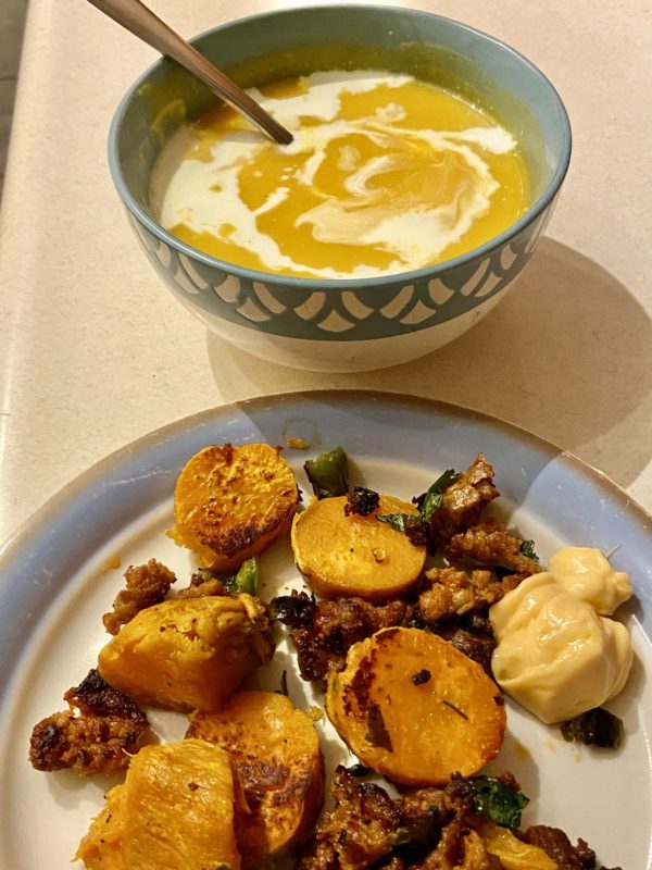 potatoes with a side of soup.