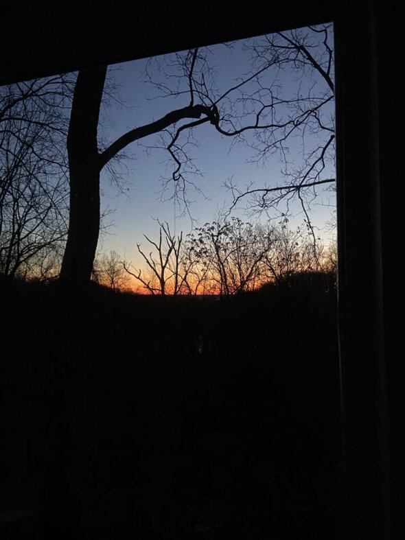 sunrise through a window.