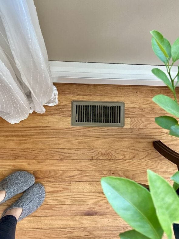 vent in a wooden floor.