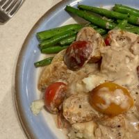 mashed potatoes, chicken, and beans.