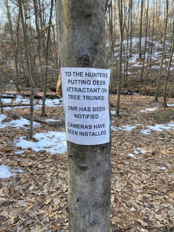 sign on a tree.