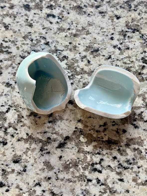 broken toothbrush holder.